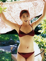 Megumi Yasu Asian cutie showing off her hot body in a bikini